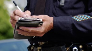 Cop Writing a New York Speeding Ticket